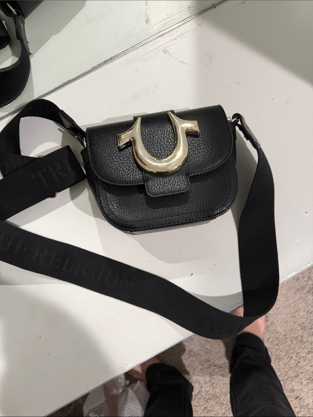 True Religion Black Pebbled Leather Crossbody with Gold Horseshoe Accent